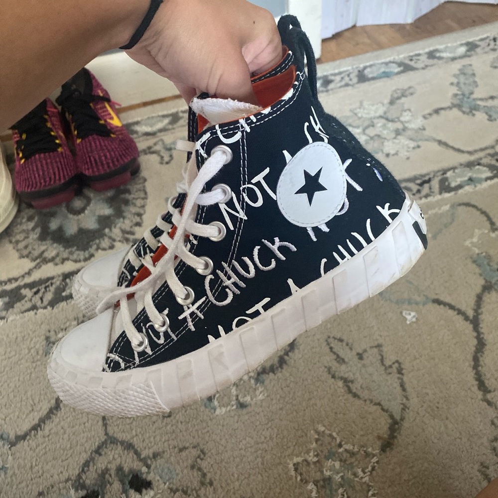 not a chuck hightop converse